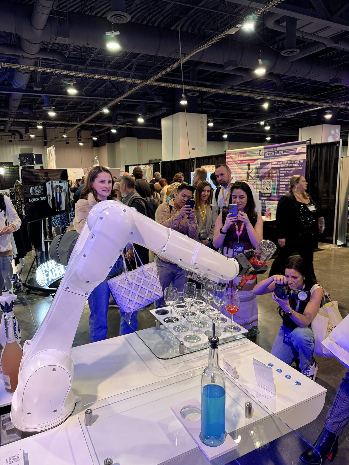 The RoboBar robot bartender drawing a crowd at the Wedding MBA in Las Vegas