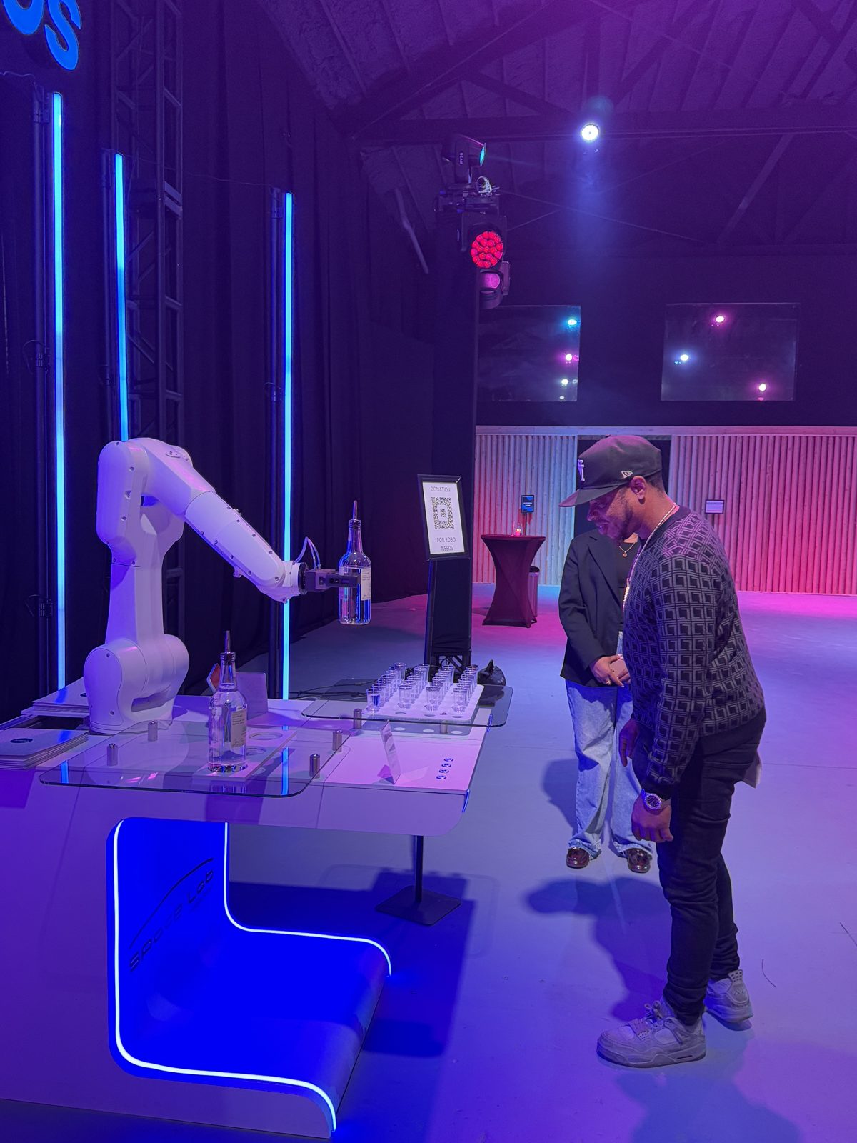 Robot bartender (RoboBar) serving cocktails at a live event