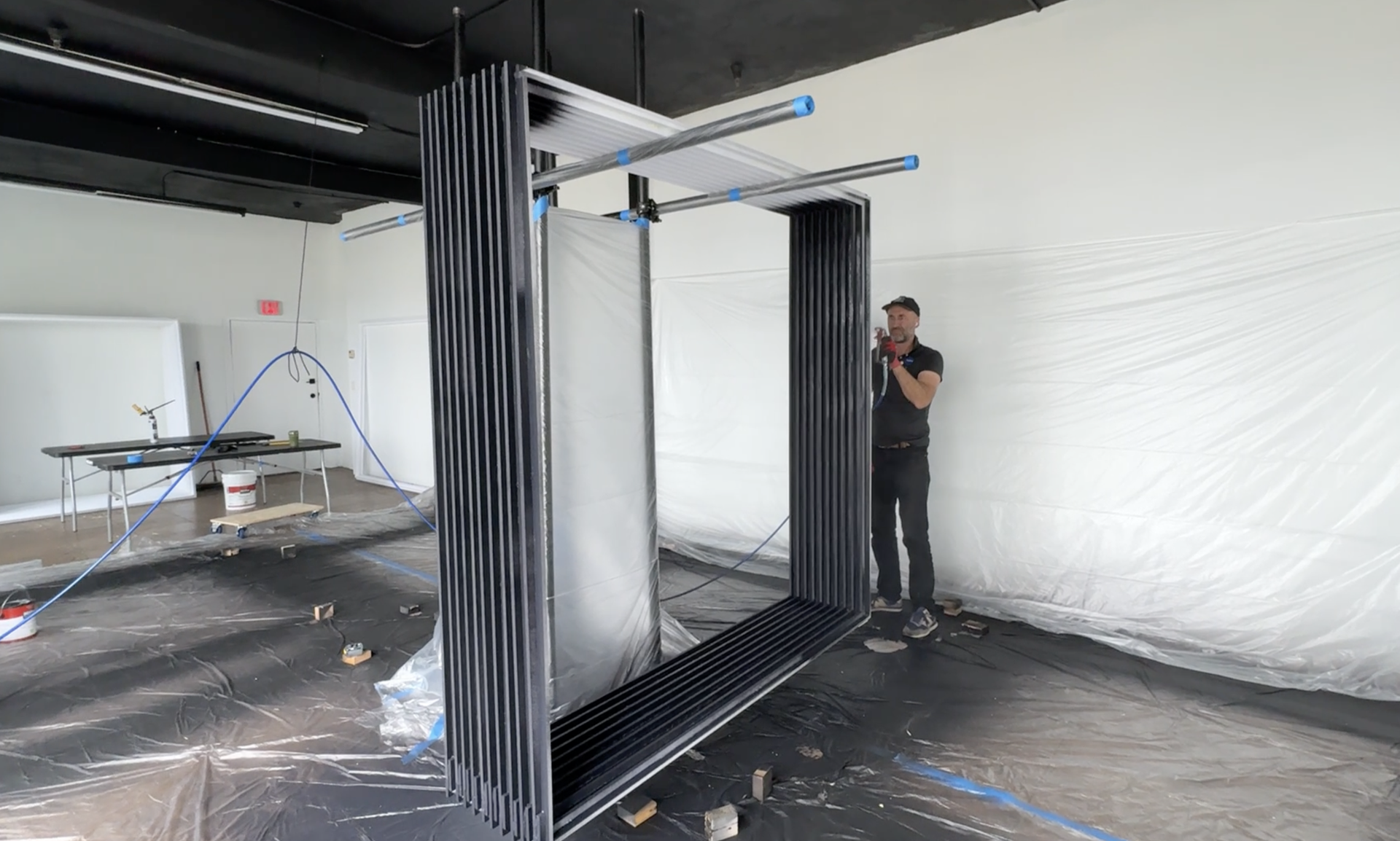 NovaInstall fabrication workshop — custom panel cutting