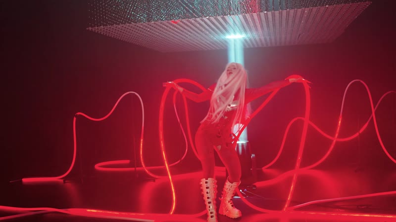 Experiential Technology — Performer with light tubes